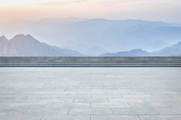 istock Empty square pavement and mountain landscape in sunny daytime 1500321611
