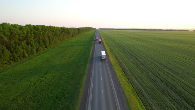 The truck is driving on the highway aerial view