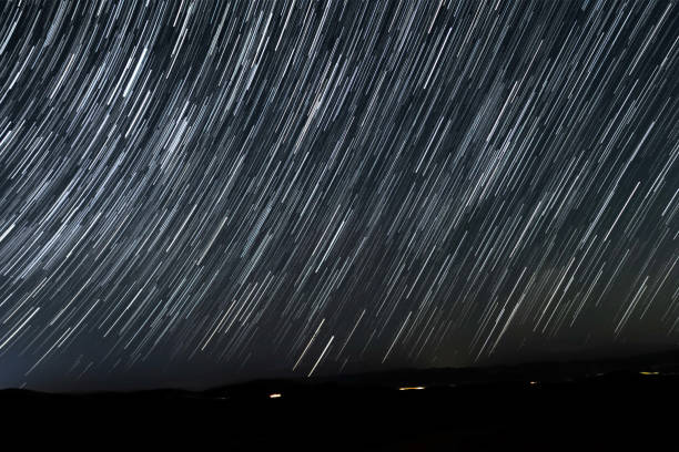 istock Moving Universe. Night sky stair trails 1500324136