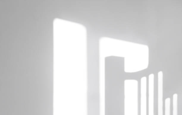 istock Blurry Shadow, Refletion sunlight on white wall background. Abstract Natural morning light effection on white background, Backdrop for overlay on product presentation 1500324231