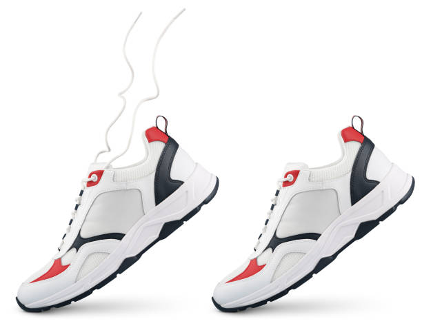 istock White sneaker with flying laces stands on the tip isolated on white 1500330347