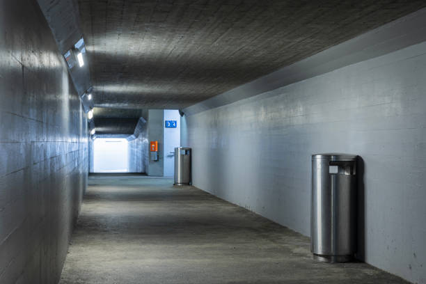 istock Long concrete pedestrian corridor that passes under the train station in Melide in Switzerland 1500332636