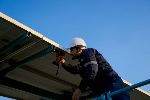 istock Employee is working at solar farm. 1500335279