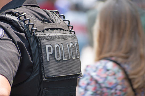 Police uniform in a crowd of people