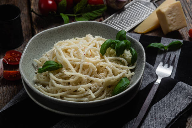 istock Spaghetti with parmesan cheese in a plate. Pasta with cheese 1500336642