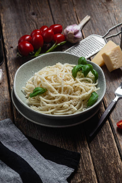 istock Spaghetti with parmesan cheese in a plate. Pasta with cheese 1500336730