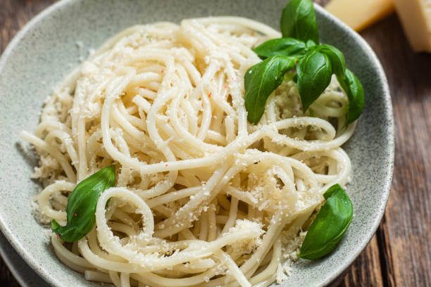 istock Spaghetti with parmesan cheese in a plate. Pasta with cheese 1500336755