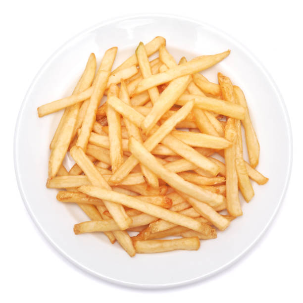 istock French fries potatoes on white ceramic plate isolated on white background 1500343767