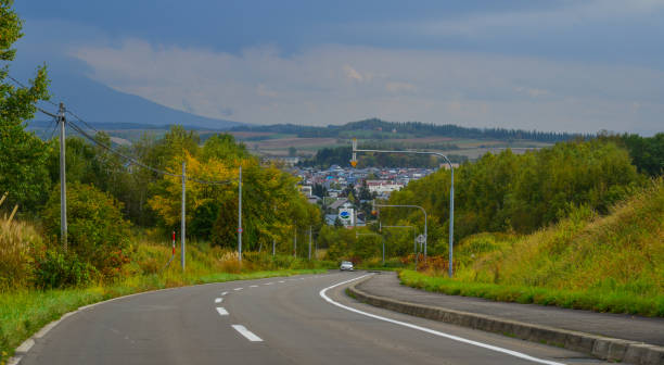 istock Rural road in Hokkaido, Japan 1500347706