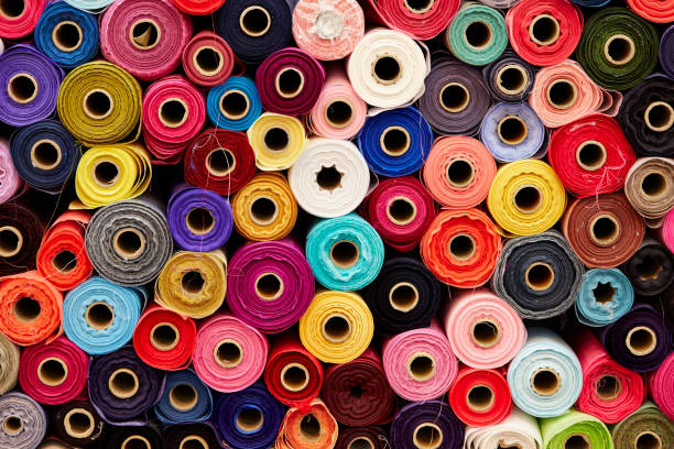 istock Roll fabrics displayed in a traditional market 1500350521