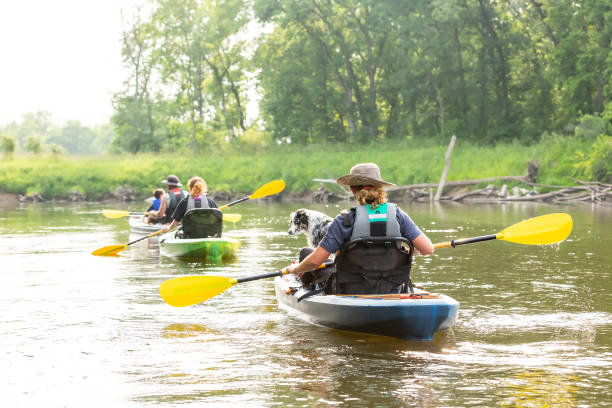 istock Family With Dog Kayaking Down Rum River in Summer 1500350694