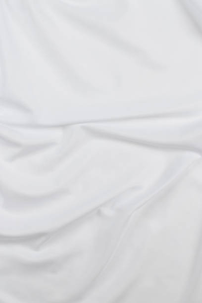 istock white cotton fabric draped, bed linen 1500351261
