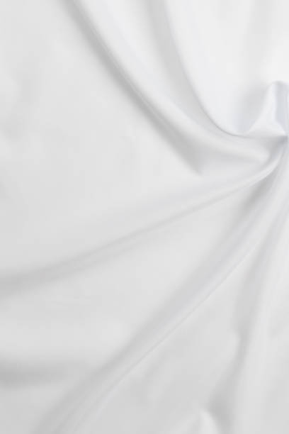 istock white cotton fabric draped, bed linen 1500351387