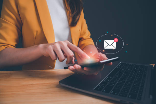 istock Business e-mail communication and digital marketing. Inbox receiving electronic message alert. businesswoman touch on email in virtual screen. internet technology. New email notification concept. 1500353779
