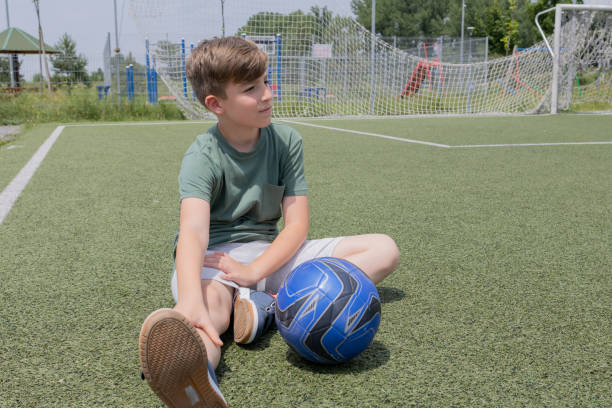 istock A boy at a soccer training football pitch 1500354100