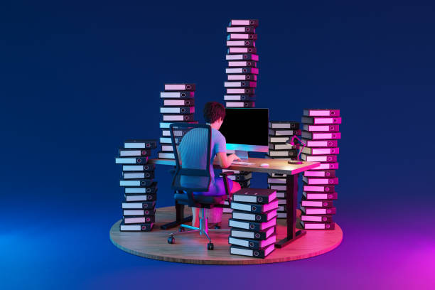 istock man sitting at pc office workplace on infinite background with stacks of document binders; workload stress burnout concept; 3D Illustration 1500354569