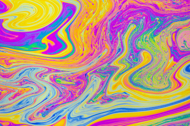 istock Psychedelic multicolored patterns background. Photo macro shot of soap bubbles 1500356073