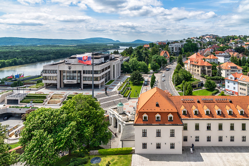 June 21, 2023: Bratislava, Slovaka - The cityscape and skyline of the city. The Bratislava Castle is the main subject in the picture and dominates the city with it's imposing presence.