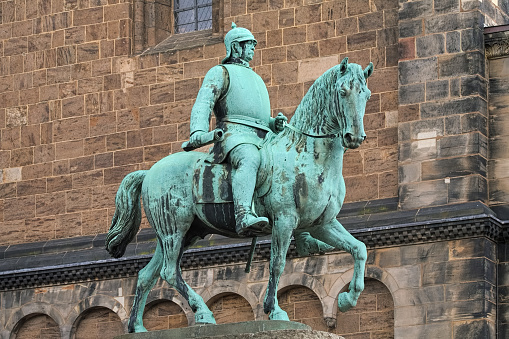 Bremen, Germany - May 26, 2015: Bismarck monument close to Bremen Cathedral. The equestrian statue of the German Chancellor Otto von Bismarck by sculptor Adolf von Hildebrand (1847-1921) was unveiled on July 9, 1910.