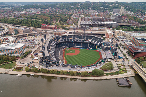 Norfolk, Virginia - March 15 2022:  Aerial view of the Tides Harbor Park Stadium with downtown Norfolk in the background