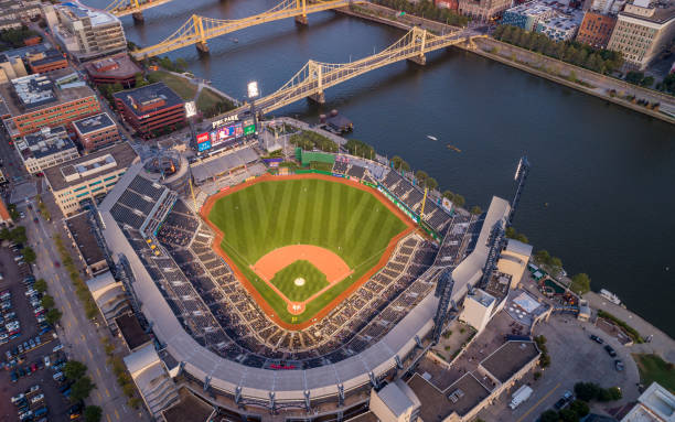 PNC Baseball Park in Pittsburgh, Pennsylvania. PNC Park has been home to the Pittsburgh Pirates since 2001. Pittsburgh, Pennsylvania - September 25, 2019: PNC Baseball Park in Pittsburgh, Pennsylvania. PNC Park has been home to the Pittsburgh Pirates since 2001. Drone Point of View american league baseball stock pictures, royalty-free photos & images