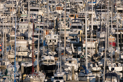 Seattle, Washington, USA -May 26, 2023: Many pleasure boats tied up at dock in local marina