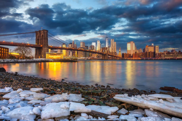 istock Brooklyn bridge and Manhattan at winter sunrise 1500363051