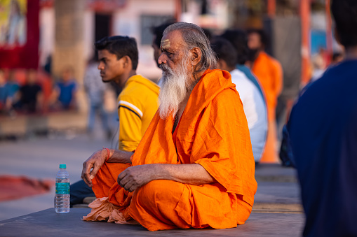 Photo of budhist monk in a temple.