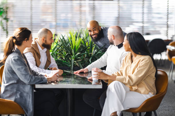 istock Coworkers Meeting at a Cafe 1500368074