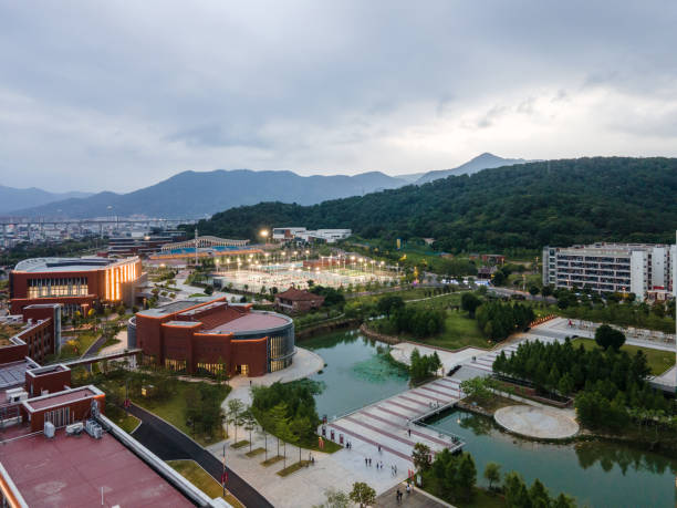 istock Side bird's-eye view of campus buildings and artificial lakes 1500369367