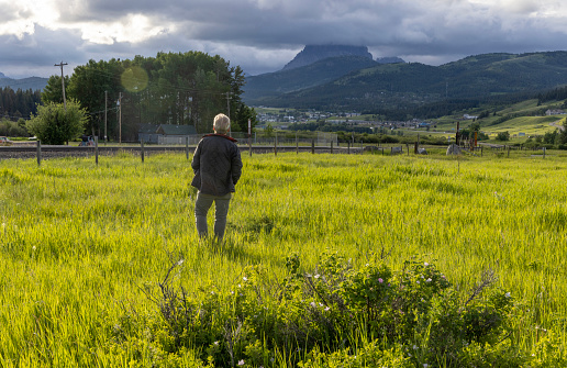 Beneath mountains and moody sky, Blairmore, AB