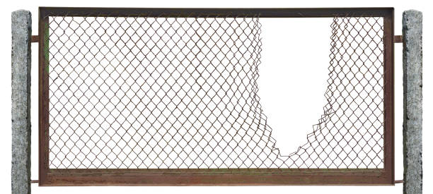 istock Torn rusty chain link fence texture background, horizontal isolated broken old aged weathered rusted iron frame, perimeter security hole concept metaphor, grungy damaged vintage panorama macro closeup, large grunge stained pattern, concrete pole posts 1500376124