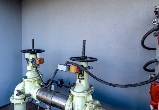 istock Water pipe main valve control system on exterior of building 1500378602