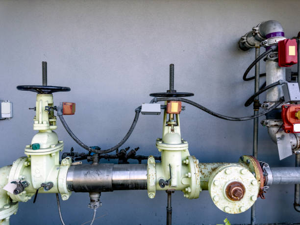 istock Water pipe main valve control system on exterior of building 1500378616