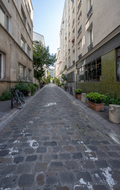istock Paris, France - 05 20 2023: Panoramic view of two typical streets with residential buildings 1500379798