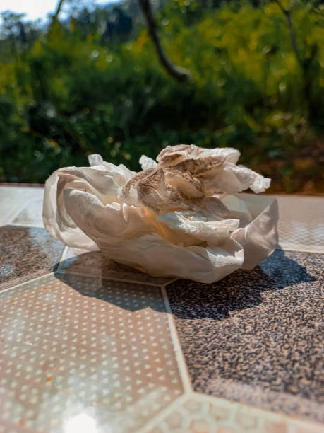 istock Used tissue paper on the floor. Dirty tissue paper 1500384880