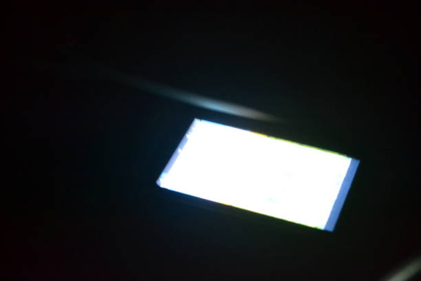 istock Screen of a smartphone brightly illuminated in the dark. 1500386164