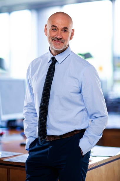 istock Confident professional man standing at the office 1500388733