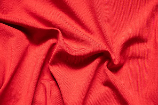 istock red crumpled fabric as background close up 1500404044