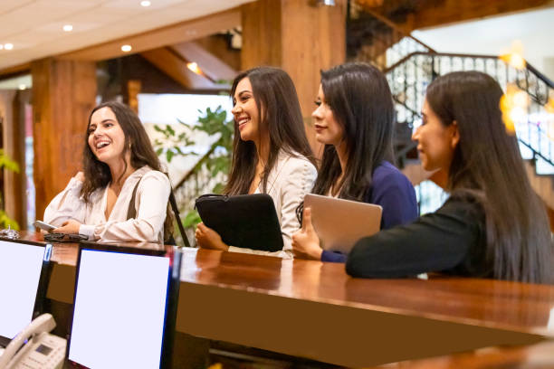 istock Women at reception for check-in 1500407738