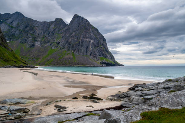 istock Sandy beach with mountains and sea coast, Lofoten, Norway 1500408604