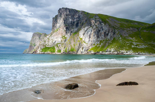 istock Sandy beach with mountains and sea coast, Lofoten, Norway 1500408607