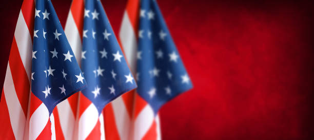 istock American flags in front of red 1500413835