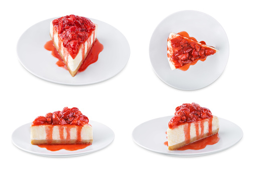 Cheesecake with strawberry sauce in a plate on a white isolated background. toning