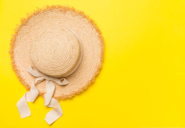 istock Straw hat on color background, top view 1500416719