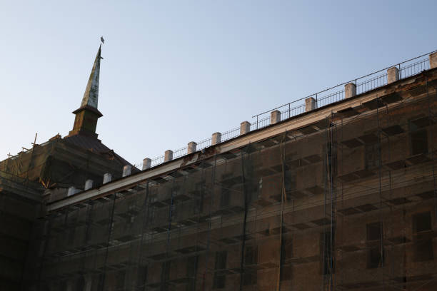 istock Abandoned building under renovation scaffolding 1500417117