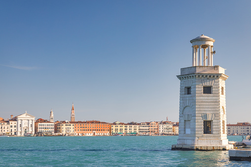 Lighthouse at San Giorgio Maggiore island of Venice lagoon, Italy, Europe.