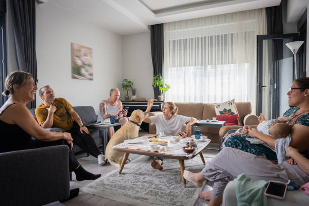 istock Home Party home gathering with middle age multiethnic friends 1500421315