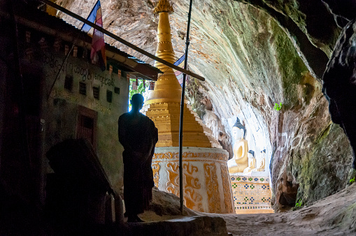 Nyaung Shwe, Myanmar - nov 9, 2012 : a stupa stands at the entrance to the Htat Eian Cave Temple, a small temple inside a cave near Nyaung Shwe, Inle Lake