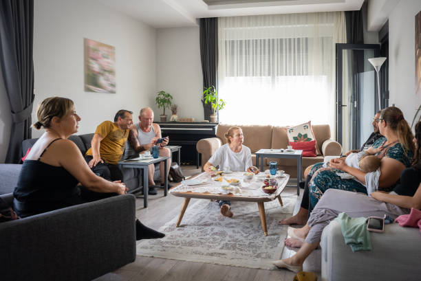 istock Home Party home gathering with middle age multiethnic friends 1500422742